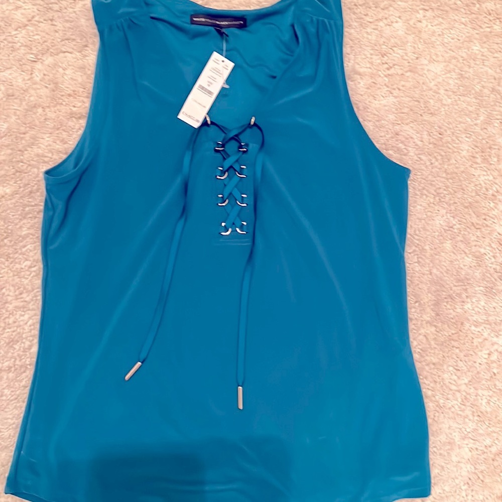 Pull over top it’s a deep aqua blue